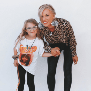 2020 Pledge Committee member Kelle Hampton with her daughter Nella
