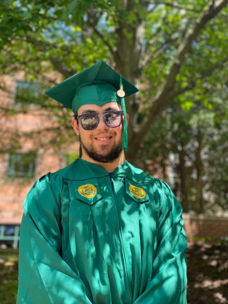 2019 Rockin' Recipient Alex Bolden in his graduation cap and gown